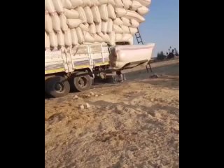 loading bags on the field